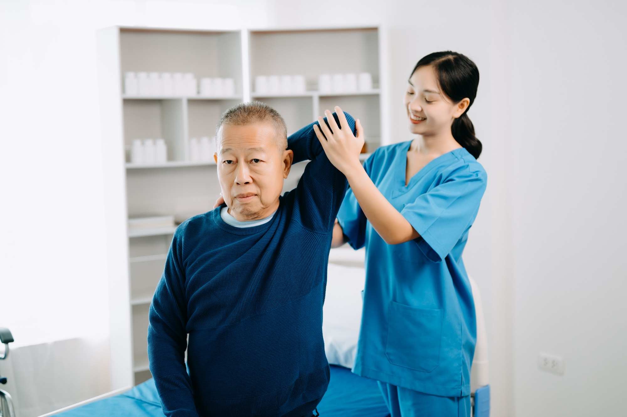 Doctor consulting with patient Back problems Physical therapy concept